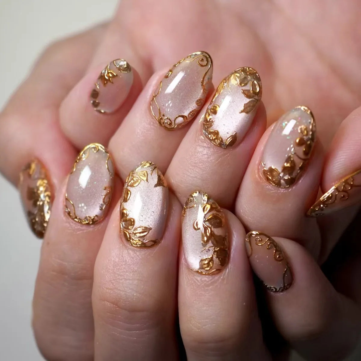 24Pcs Glamorous French Almond Fake Nails with Gold Edge Glitter - Stunning Swirl Metal Nail Art for Effortless Elegance